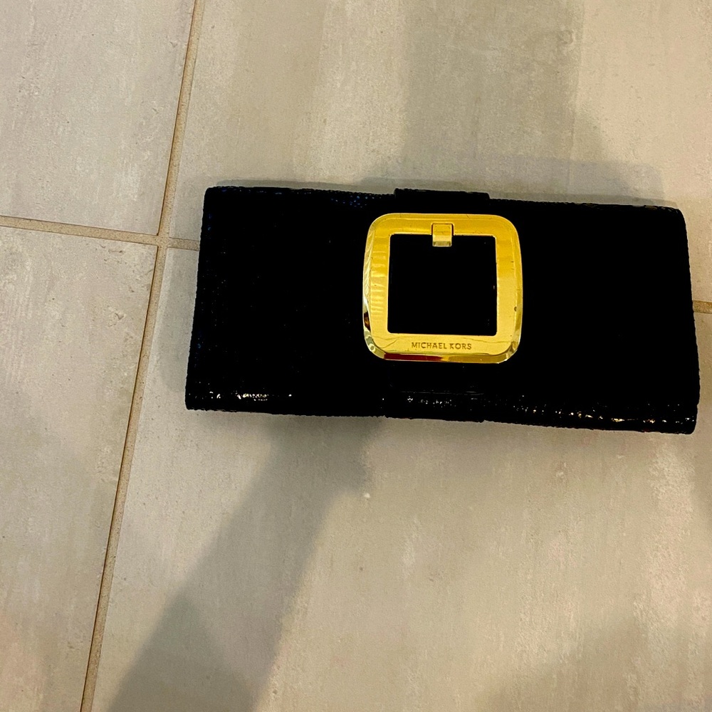 Michael Kors black clutch, in great condition, like new, barely used,